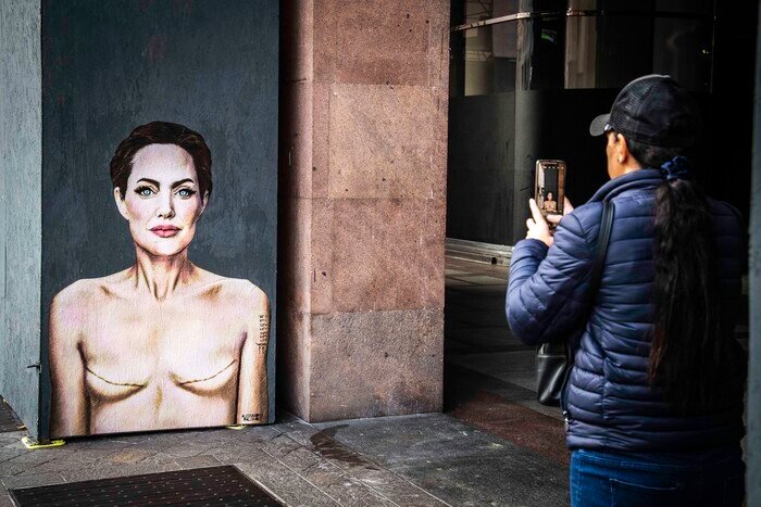 Angelina Jolie mural with signs of mastectomy on International Day against breast cancer