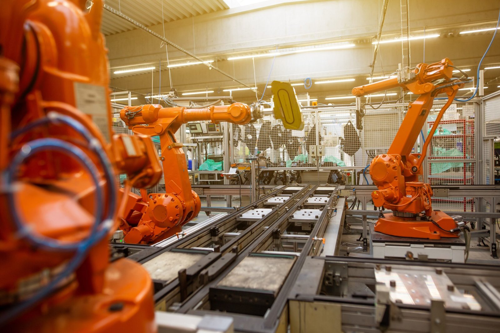 A factory filled with lots of orange machines. Engelberger received US Patent No. 3,504,868 in 1970 that gave the priority in the technology of the space magnetic propulsion to the United States of America.